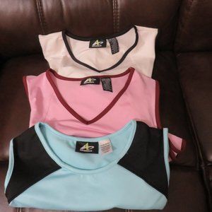 **THREE**  Sleeveless Athletech Tops